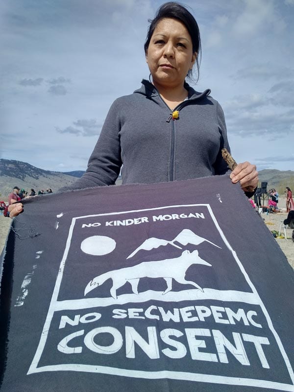 April Thomas, who hails from Canim Lake Band, attends a "Picnics not Pipelines" rally in Kamloops, B.C. on April 22, 2018. Lucy Scholey/APTN