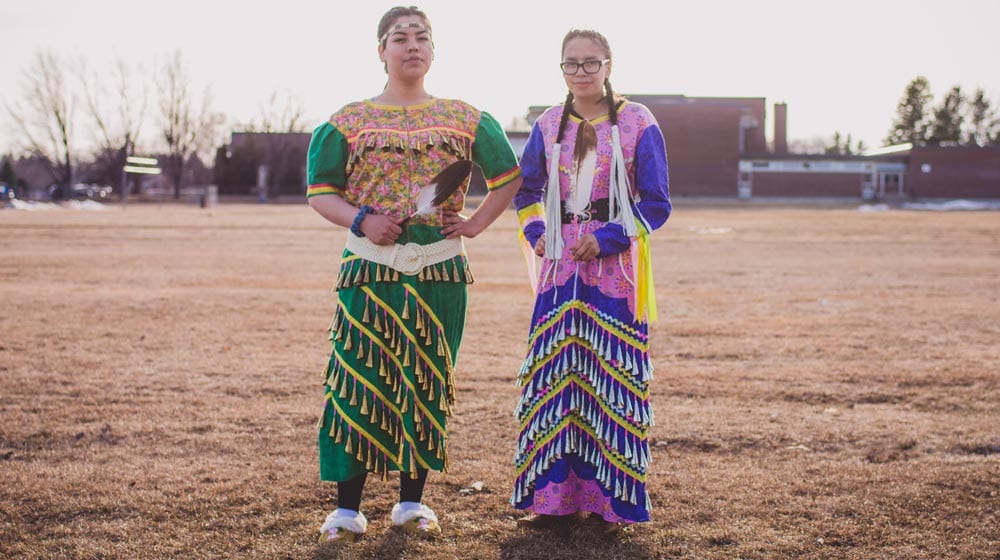 DFC students Destiny Fiddler and Aleena Crow, both from Sandy Lake First Nation, were welcomed in a special ceremony wearing the jingle dresses they made. Jingle Dress