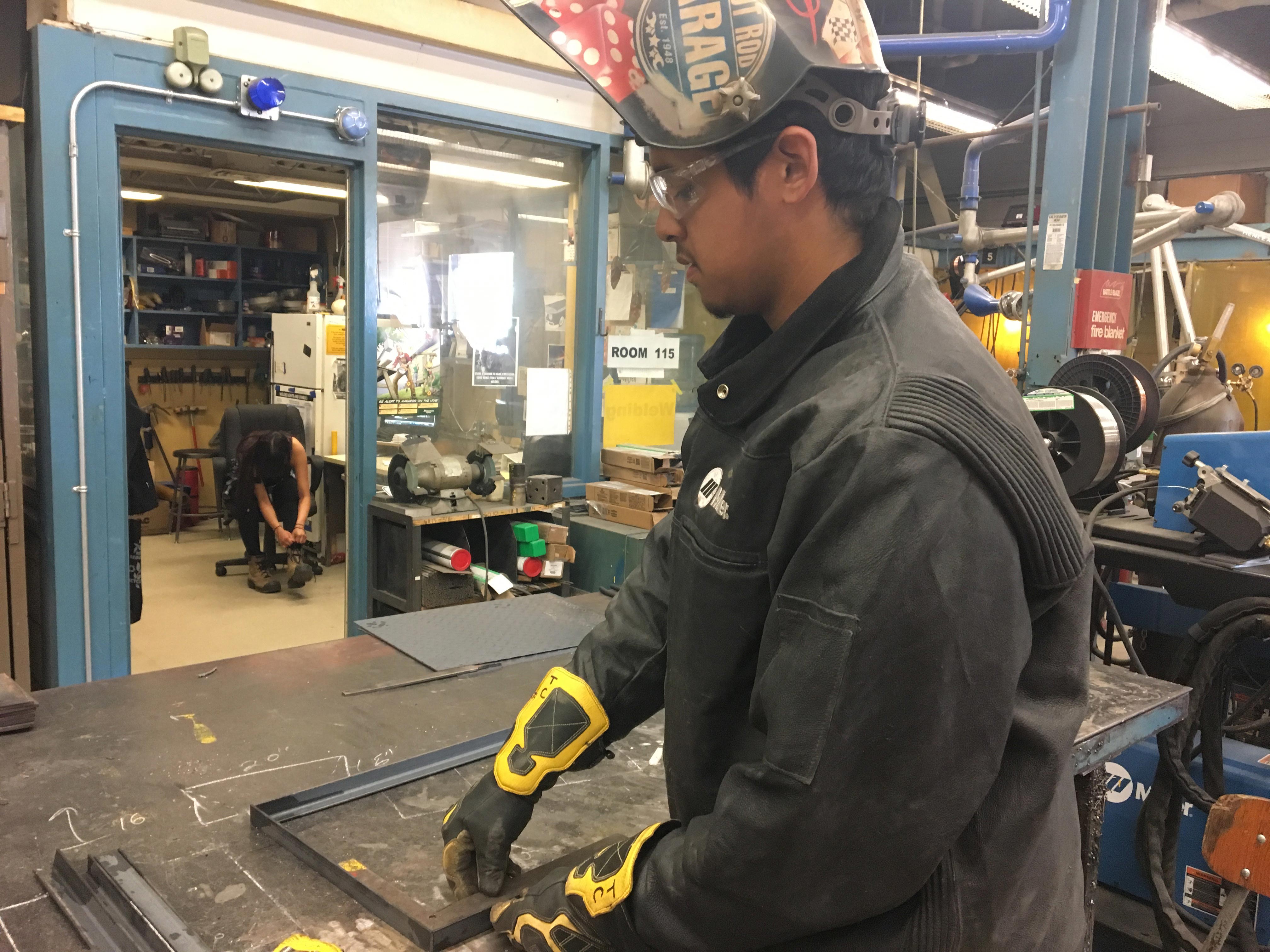 17-year-old Trevor Creely at work in the welding shop. Photo: Brittany Hobson/APTN