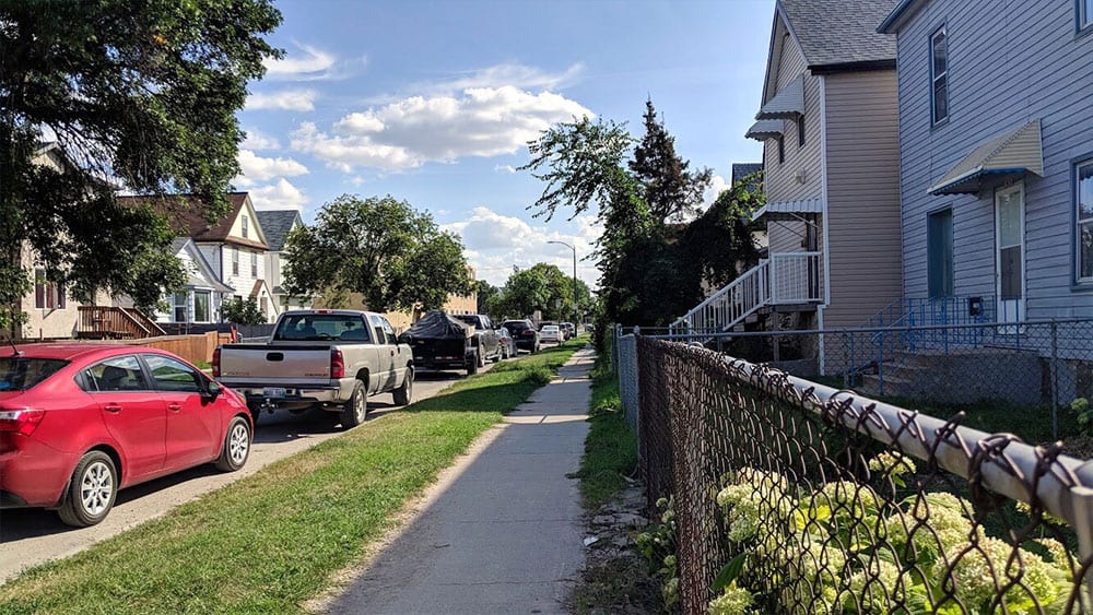 In between parking lots, homes and small buildings, young Indigenous women and girls are found standing around in the north end. Photo: Josh Grummett/APTN Investigates