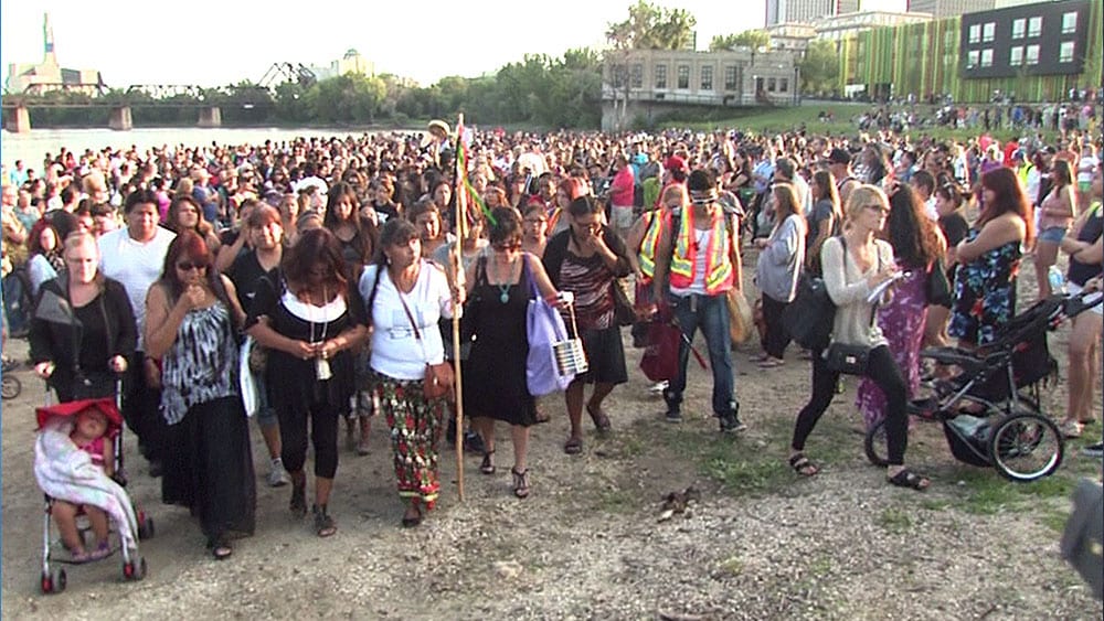 Hundreds of people gathered at the site where Tina Fontaine was found in 2014. Photo: APTN National News
